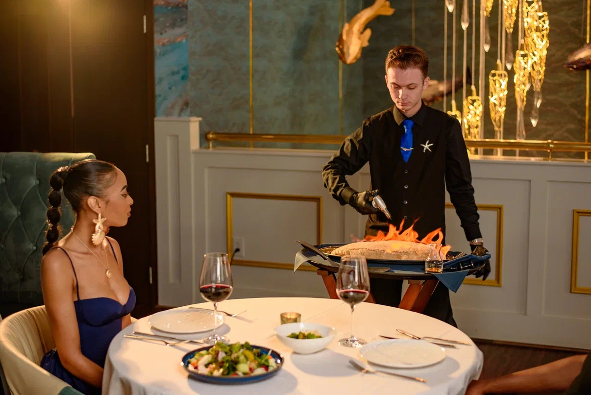 Flaming tableside presentation at Sea Grill