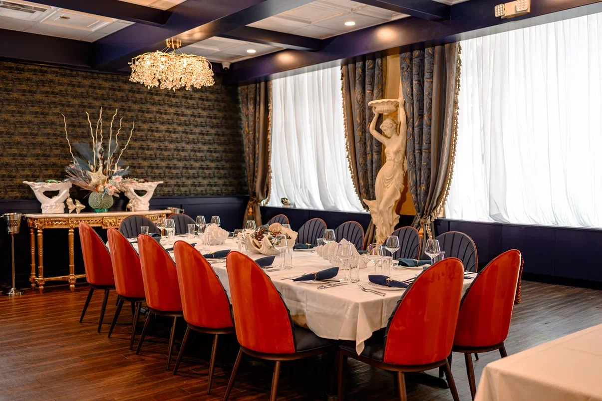 Pearl Room with orange chairs at Sea Grill